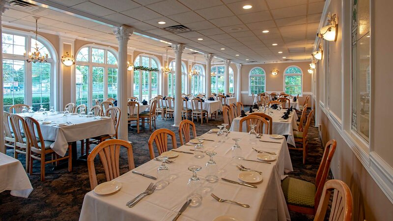 Dining room with multiple set tables